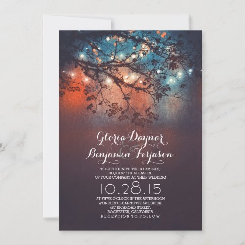 Rustic tree branches hanging string lights wedding invitation