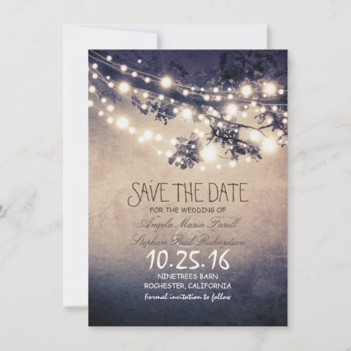 Rustic tree branches  string lights save the date
