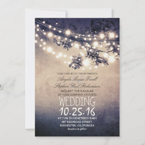 Rustic tree branches  string lights wedding invitation
