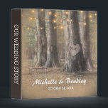 Rustic Tree & String Lights Wedding Story Album 3 Ring Binder<br><div class="desc">Rustic country wedding album featuring an enchanting outdoor woodland wedding setting,  glowing string twinkle lights,  a romantic carved heart on the trunk of a tree with your initials,  your names and wedding date.</div>