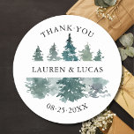 Rustic Trees Forest Woodland Thank You Wedding Classic Round Sticker<br><div class="desc">Elegant watercolor pine forest trees (woodland / mountain) in deep green colors.  Perfect stickers / labels for a rustic winter wedding.  Perfect for envelopes,  favors,  gifts,  etc... Easy editable template - just add text.  Option to change color & size.  See the 'LAUREN' collection for matching items.</div>