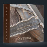Rustic Wedding Brown Country Western Horse 3 Ring Binder<br><div class="desc">Horse saddle close up vintage antique old country western farm style wedding photo album binder. Rustic brown rodeo equestrian art printed design for newlyweds. Personalize names and date. Image copyright Marg Seregelyi Photography.</div>