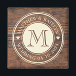 Rustic Wedding Heart Monogram in Dark Walnut Magnet<br><div class="desc">Elevate your rustic wedding décor with the Rustic Wedding Heart Monogram in Dark Walnut Magnet. This charming magnet features a heart monogram design set against a rich dark walnut background, adding a personalized touch to any magnetic surface. Whether used to secure important notes or to adorn your refrigerator with sentimental...</div>