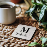 Rustic White Washed Wood Custom Monogram Initial Beverage Coaster<br><div class="desc">This simply elegant custom monogrammed beverage coaster set features classic black monogram text that can be personalized with a last name initial and last name. A beautiful keepsake gift for a newlywed couple, family, or new homeowners. A white washed faux wood grain background adds a rustic textured look to the...</div>