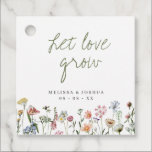 Rustic Wildflowers Let Love Grow Wedding Seeds  Favor Tags<br><div class="desc">Pretty favor tags for your seeds packet favors,  featuring the editable headline "let love grow" in sage green handwritten style font,  and a border of watercolor wildflowers in pink,  blue,  lilac,  yellow and white. The reverse features the same  border of flowers and an editable message.</div>