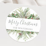 Rustic Winter Greenery Merry Christmas Classic Round Sticker<br><div class="desc">Beautiful envelope seal stickers featuring hand-painted botanical watercolor illustrations of winter greenery,  pine and spruce branches,  cones and holly berries. Makes a great addition to Christmas gifts or as holiday card envelope seals.</div>