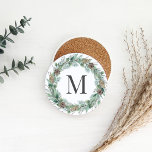 Rustic Winter Greenery Monogram Initial Wreath Coaster<br><div class="desc">Elegant holiday sandstone stone beverage coaster design features a rustic chic wreath of winter watercolor greenery framing a family / last name monogram initial. Includes a white background color.</div>