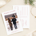 Rustic Winter Greeting Family Photo Christmas Postcard<br><div class="desc">Celebrate the holiday season with our Rustic Winter Greeting Family Photo Christmas Postcard. Featuring charming red typography on a simple winter background, this postcard brings a warm, minimalist touch to your holiday greetings. The cozy family portrait, set against a snowy landscape, conveys a heartfelt message of peace and love—perfect for...</div>