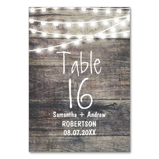 Rustic Wood And String Lights Table Number Card