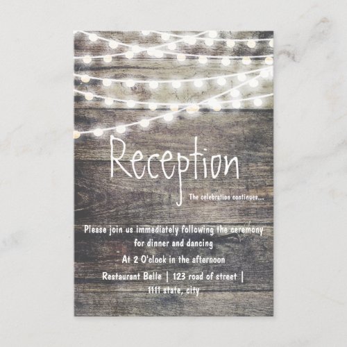 Rustic wood and string lights wedding reception enclosure card