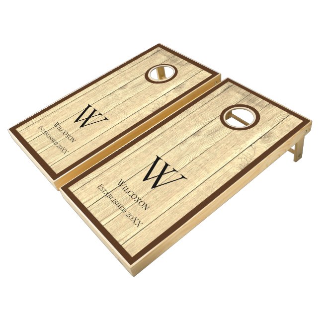 Rustic wood family monogram farmhouse keepsake cornhole set (Angled)