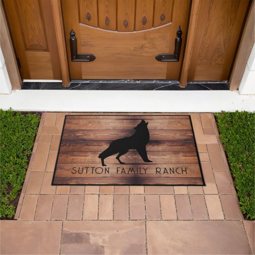 Rustic Wood Family Name Howling Wolf Silhouette Doormat