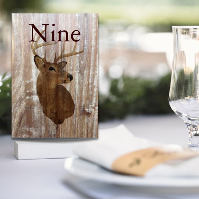 rustic wood grain deer the hunt is over wedding table number (rustic wood grain deer the hunt is over wedding table number)
