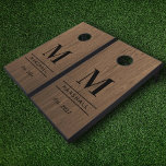Rustic Wood Grain Personalized Wedding Monogram Cornhole Set<br><div class="desc">Elegant and minimalistic custom monogrammed cornhole yard game set features classic black monogram text that can be personalized with a last name initial, last name, and year established (married). A beautiful keepsake for and after the wedding day. A walnut brown faux wood grain background adds a rustic textured look to...</div>