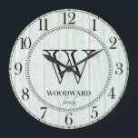 Rustic Wood Lake House Family Name  Large Clock<br><div class="desc">A rustic modern light aqua blue monogrammed family name lake house or cottage wall clock. wall clock with a light wood surface pattern and family name with initial. Add your family name and surname initial.</div>