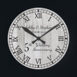 Rustic Wood Look 5th Wedding Anniversary  Round Clock<br><div class="desc">The classic gift for the 5th anniversary is wood. With that in mind we have created this rustic faux wood modern fifth anniversary design with Roman numerals, your names and wedding date. Composite design by Holiday Hearts Designs (rights reserved). If you have any questions or need assistance with the design...</div>