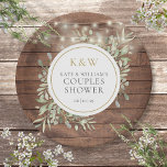 Rustic Wood Monogram Greenery Couples Shower Paper Plates<br><div class="desc">Featuring pretty string lights and delicate watercolor greenery leaves on a rustic wood background,  these chic botanical couples shower paper plates can be personalized with your monogram initials and special couples shower details. Designed by Thisisnotme</div>