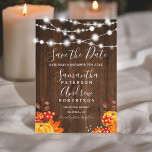 Rustic wood pumpkin string lights save the date<br><div class="desc">Rustic brown wood with string lights wedding save the date with hand painted pumpkins,  maple leaf on a vintage brown wood and elegant calligraphy typography. Perfect for fall autumn weddings. Perfect for country ,  barn wedding themes.</div>