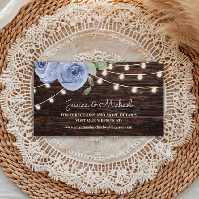 Rustic Wood String Lights Blue Floral Wedding Business Card (Dusty blue watercolor floral and string lights on rustic wood wedding website enclosure card)