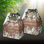 Rustic Wood String Lights Foliage Wedding Favor Boxes<br><div class="desc">A rustic wedding favor box featuring delicate sage and lilac watercolor leaves and pretty string lights on a wood panels background. You can personalize with your own thank you message on the reverse. A perfect way to say thank you to your guests! Designed by Thisisnotme©</div>