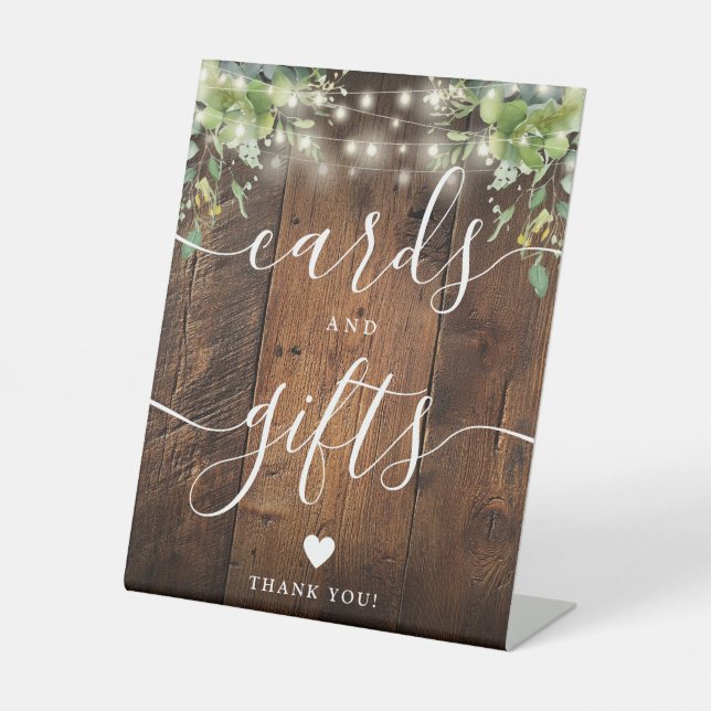 Rustic Wood String Lights Greenery Cards And Gifts Pedestal Sign (Front)