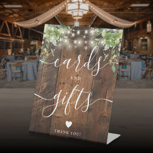 Rustic Wood String Lights Greenery Cards And Gifts Pedestal Sign