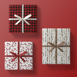 rustic woodland christmas gift wrapping paper trio<br><div class="desc">set of three watercolor wrapping paper sheets,  including red winter berries,  twigs / branches and falling snow,  and classic red and black buffalo plaid check.</div>