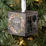 Rustic Woodsy Our First Christmas Engaged 3 Photo Cube Ornament<br><div class="desc">Create a keepsake you will cherish for a lifetime with this boho rustic, woodsy faux dark wood-style, feathers and dark olive to sage greenery with twigs floral wreath, three photo design with your unique quotation or message on bottom. Wreath is sprinkled with faux twinkle lights. Front includes "Our First Christmas...</div>