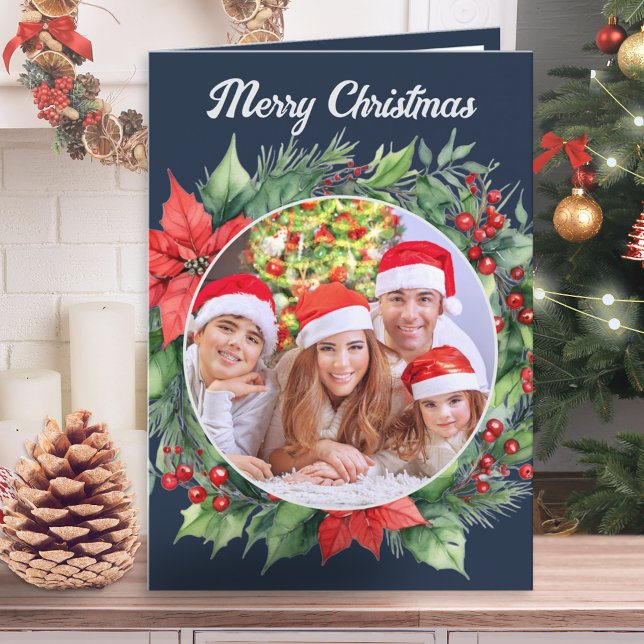 Rustic Wreath Family Photo Navy Blue Christmas Holiday Card (A Christmas card in navy blue with custom photo, 'Merry Christmas' greeting, foliage and red berries)