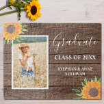 Rustic Yellow Sunflower Wood Graduation  Jigsaw Puzzle<br><div class="desc">Rustic Yellow Sunflower Wood Graduation Jigsaw Puzzle. Sunflowers bring joy and Graduation is a joyous time! Celebrate your Graduate's success with this unique jigsaw puzzle. It makes a special keepsake for family and friends. This eye catching design is decorated with yellow sunflowers and green foliage on a barn wood background....</div>