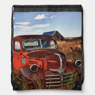 Rusting orange Dodge truck with abandoned farm Drawstring Bag