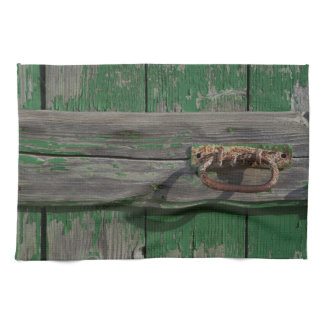 Rusty Door Handle On Green Door Towel