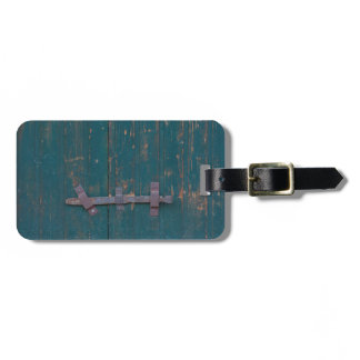 Rusty Door Latch On Green Door Luggage Tag