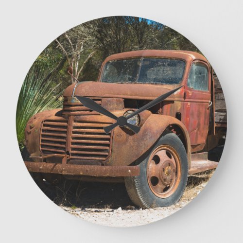 Rusty old truck abandoned in outback Australia Large Clock