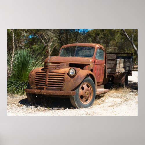 Rusty old truck abandoned in outback Australia Poster