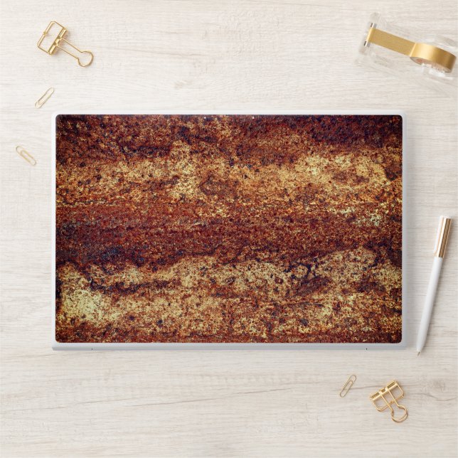 Rusty sticker on laptop skin (Desk)