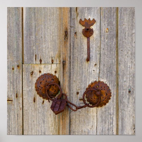 Rusty vintage old iron padlock on a wooden door  poster