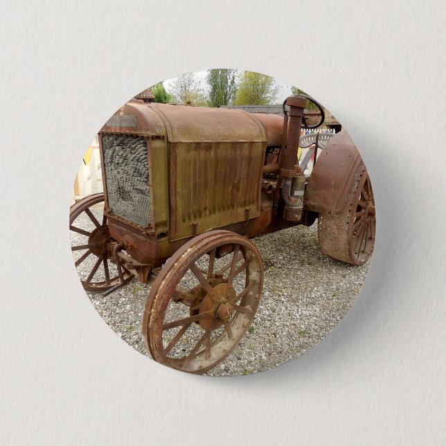 Rusty vintage tractor button (Front)