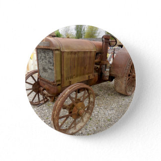 Rusty vintage tractor button