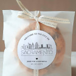 Sacramento Skyline | Wedding Welcome Favor Classic Round Sticker<br><div class="desc">Enhance your wedding welcome packages or event party favors with a custom set of welcome stickers! These elegant yet minimal-style stickers are tailored for a wedding taking place in the beautiful city of Sacramento, California. They feature a modern deco skyline with the name of the city integrated underneath. All elements...</div>