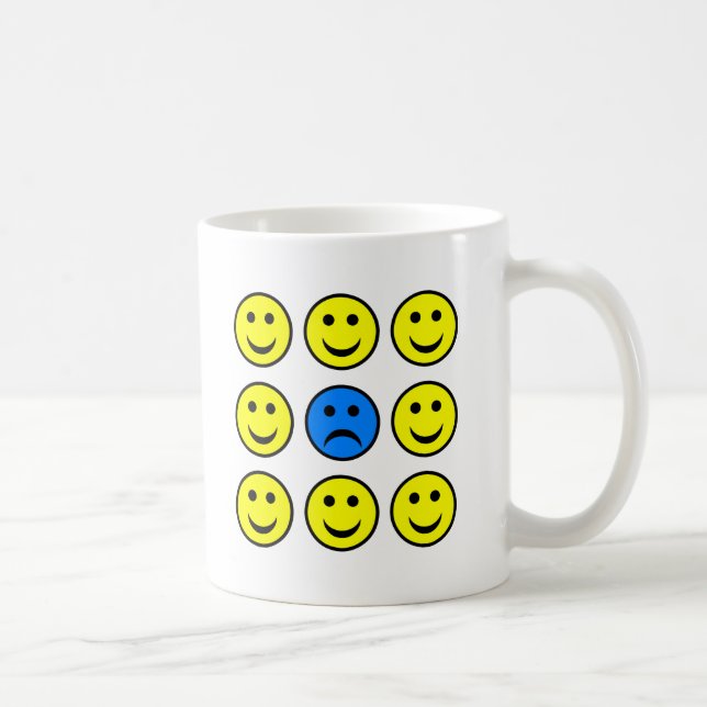 Sad Face in a Crowd of Happy Coffee Mug (Right)