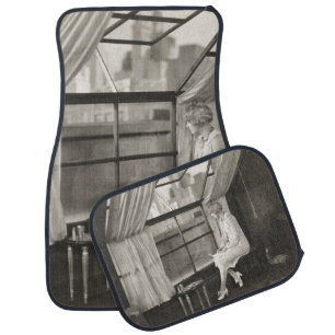 Sad woman staring out window1940s, woman, vintage, car floor mat