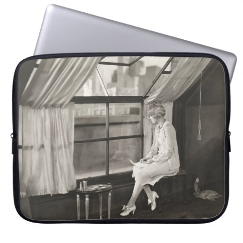 Sad woman staring out window1940s woman vintage laptop sleeve