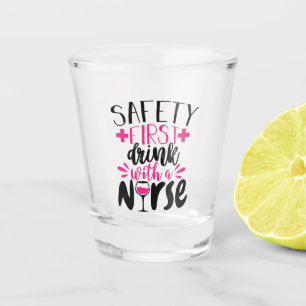 Safety first drink with a nurse word art shot glass