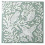 Sage Green Birds Thistle Nature Scene Ceramic Tile<br><div class="desc">In restful, natural, pretty tones of sage green, this tile features a trio of little birds seeking thistle seed in a woodland forest with stylized floral and foliage designs. My artwork is inspired by intricate antique chinoiserie pottery and tapestry art, such as William Morris' iconic pieces. This tile would be...</div>