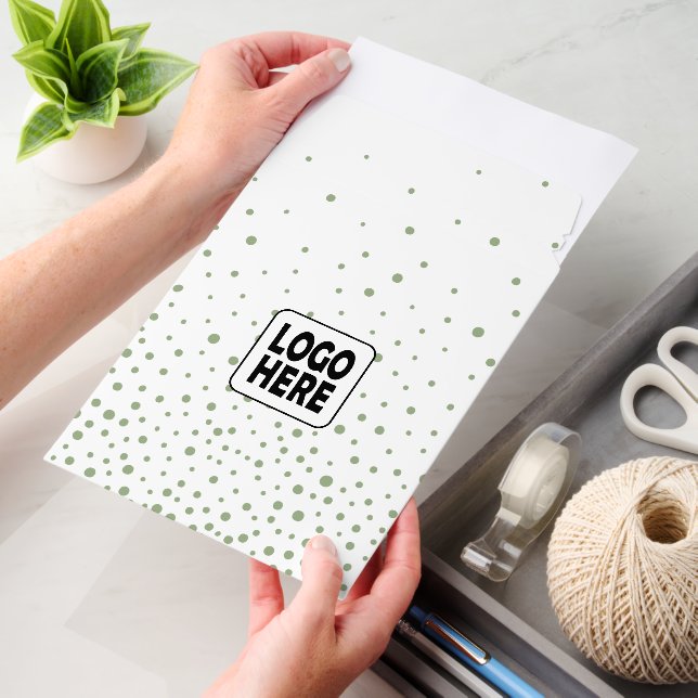 Sage green confetti and custom logo business envelope mailers (Desk)