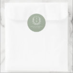 Sage Green Crest Modern Monogram Wedding  Classic Round Sticker<br><div class="desc">Enhance your wedding with the Sage Green Crest Modern Monogram Wedding Classic Round Sticker. This elegant sticker features a soft sage green background, a refined crest design, and a personalized monogram, making it the perfect addition to your invitations, party favors, or wedding decor. The subtle yet sophisticated color and modern...</div>