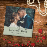 Sage Green Elegant Wedding Love and Thanks Photo Magnet<br><div class="desc">Share your gratitude with this elegant Sage Green “Love and Thanks” wedding magnet. The front features your favorite wedding photo along with your personalized names and date, creating a keepsake your guests will treasure. A perfect small thank-you gift that’s both stylish and meaningful ideal for fridges, boards, or any special...</div>