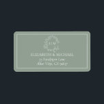 Sage Green Leafy Crest Monogram Wedding Address La Label<br><div class="desc">Modern and trendy, this return address label design features a sage green hand drawn leafy wreath encircling a modern wedding monogram. It is personalized in elegant typography, name & address in a matching sage green color, trimmed in a delicate frame. Part of a collection, veiw suite here: https://www.zazzle.com/collections/sage_green_leafy_crest_monogram_wedding_invitation-119735143483526238 Contact designer...</div>