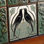 Sage Green Mackintosh Black Birds Art Deco Decor Ceramic Tile<br><div class="desc">This ceramic tile features two black birds and intricate floral patterns reminiscent of the iconic style of Mackintosh. He was a prominent Scottish architect, designer, and artist of the Art Nouveau movement. Clean lines, geometric shapes, and a strong sense of symmetry characterize his work. These elements are beautifully represented in...</div>